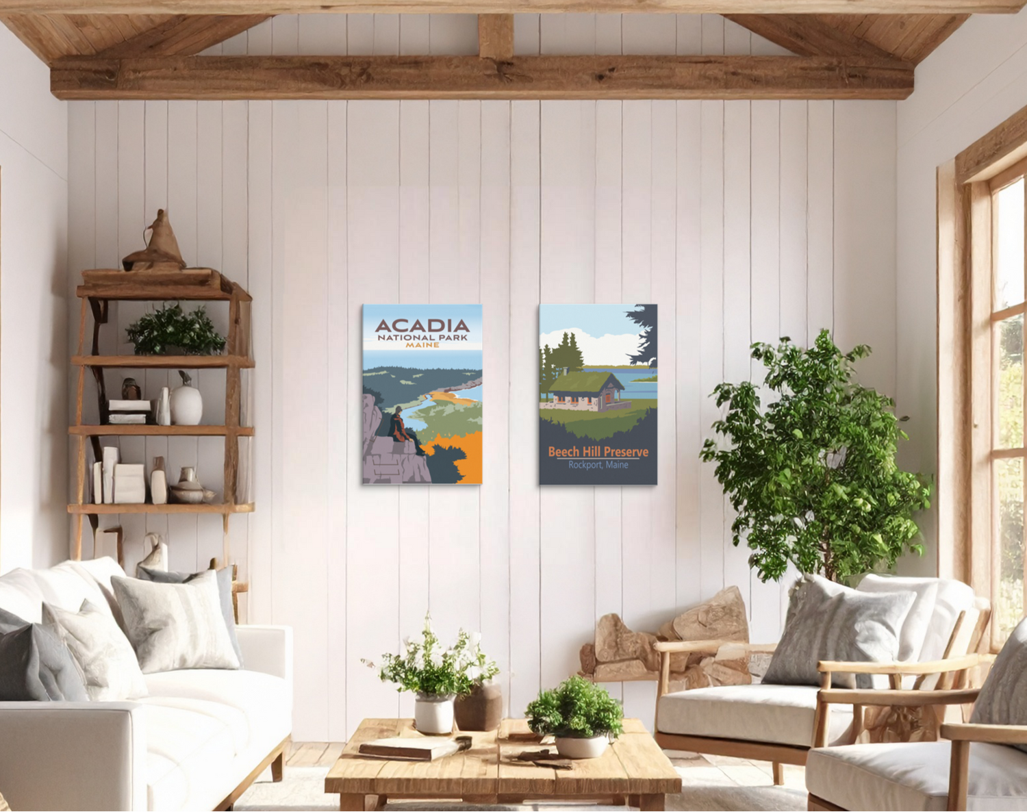 Two 12x18 canvas art prints featuring Acadia National Park and Beech Hill Preserve hang on a white shiplap wall in a bright, rustic Maine living room with wood beams, neutral furniture, and natural light.